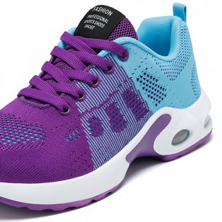 Purple and blue sneaker with white sole on a white background