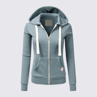 Light blue hoodie with a zipper on a light gray background