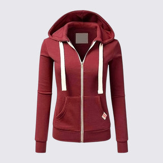Red hoodie with a white zipper on a light gray background
