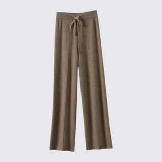 Brown pants with a drawstring on a light gray background