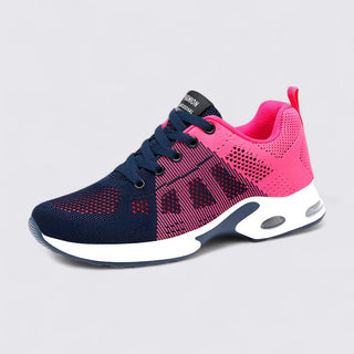 Navy and pink sneaker on a light gray background