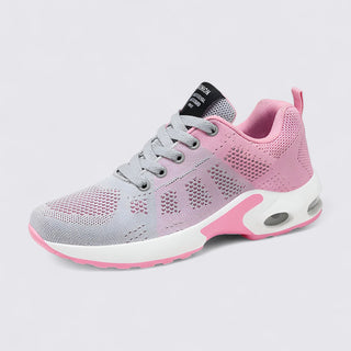 Pink and gray sneaker on a light gray background