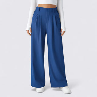 Blue wide-leg pants worn by a person on a white background
