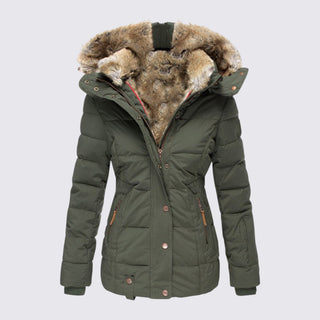 Green winter jacket with fur-lined hood on a light gray background
