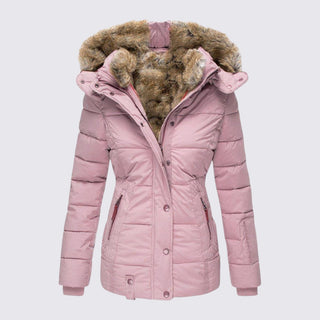 Pink winter jacket with fur-lined hood on a light gray background