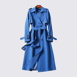 Blue trench coat on a light gray background